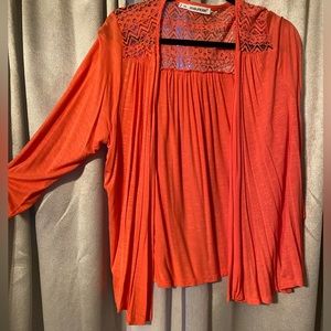 Orangish-pink long sleeved cardigan with lace